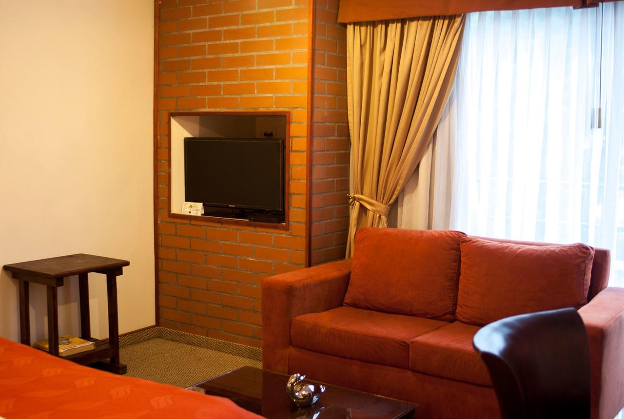 Apartaestudios Los Andes Богота Екстериор снимка