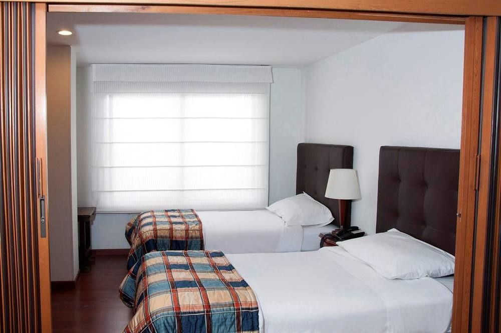 Apartaestudios Los Andes Богота Екстериор снимка