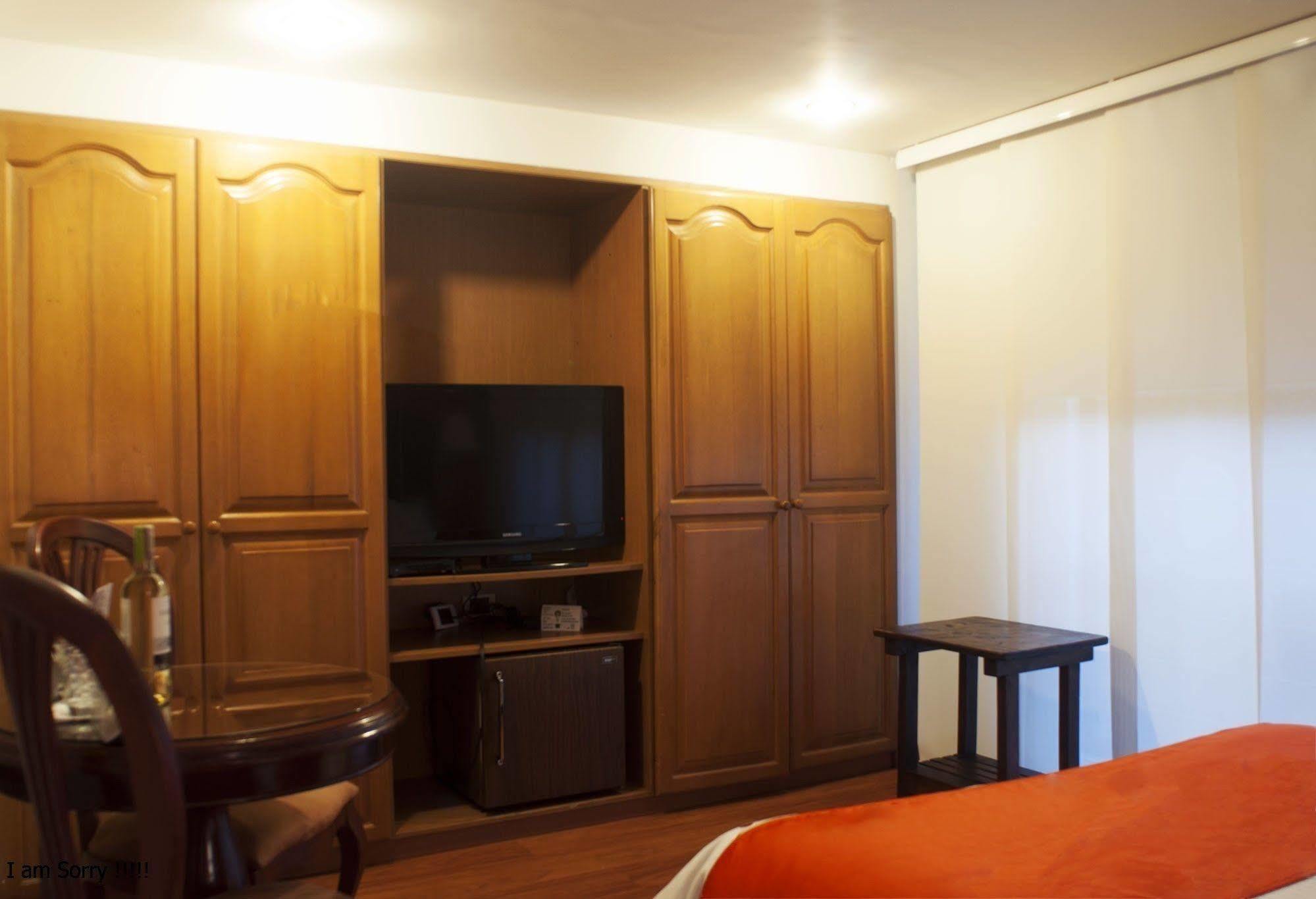 Apartaestudios Los Andes Богота Екстериор снимка